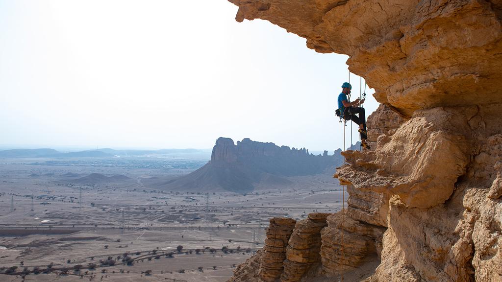 Edge of the World with 4x4 vehicle, camels and stargazing